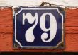 House number tile plaque with floral ornament