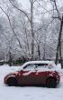 Car covered by snow.