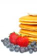 Pancakes, blueberries and strawberries