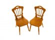 Two wooden chairs isolated on a white