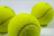 tennis balls on gray