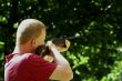 Young man with a hunting rifle