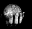 Globe in a girl`s hands