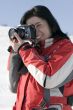 Attractive woman holding a camera