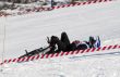 Snow biker downhill after accident in winter