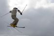 Freestyle. Snow Skier Jumping over sky.