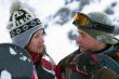 A lifestyle image of two young snowboarders