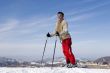 Snow Skier Jumping Against Blue Sky