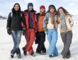 Group of sports teenagers in winter mountains