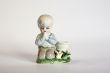 ceramic figurine of boy