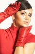 Atractive brunet in red blouse and red gloves