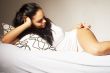 Woman Relaxing in Bed