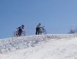 Couple of professional bikers in Tien Shan