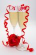 glass of champagne with a red heart