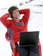 Happy teens student with laptop in winter