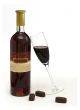 Bottle and wineglass with wine and chocolate candy