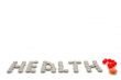Tablet inscription `HEALTH?`.