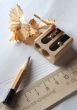 Drafting tools: pencil, paper, ruler and sharpener