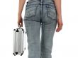 Woman in blue jeans with metal case