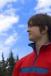 European teen boy in red sport pullover