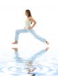 virabhadrasana warrior pose on white sand