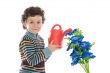 Child watering flowers