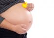 Pregnant woman with toy duck