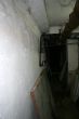 scene of the cellar and destroyed wall