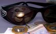 The Spectacles and money. Reflection