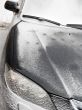 The black automobile in snow