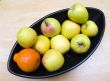 Black Japanese vase with apples and tangerine
