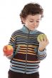 child with eating two apples