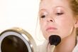 Putting on makeup