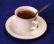 Cup of tea with teaspoon