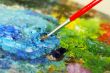 small painbrush is mixing colors