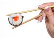 female hand holding sushi #2