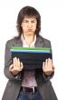 Busy business woman carrying stacked files
