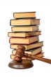 Wooden gavel and old law books