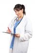Female doctor writing