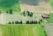  Aerial View of Farming House with red roof