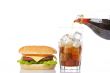 Cheeseburger and pouring soda