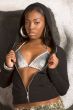 African-American  Urban girl in sexy hooded outfit by graffiti w