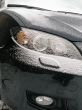 The black automobile in snow