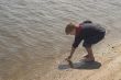 Boy Playing at the Ocean