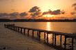 Sunrise or Sunset over a Pier