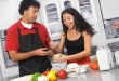 young couple cooking