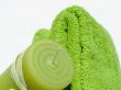 Green towels and candle