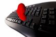 Computer keyboard and a heart isolated