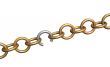 The broken off silver part in a 3d gold chain