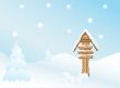 Signpost in winter landscape
